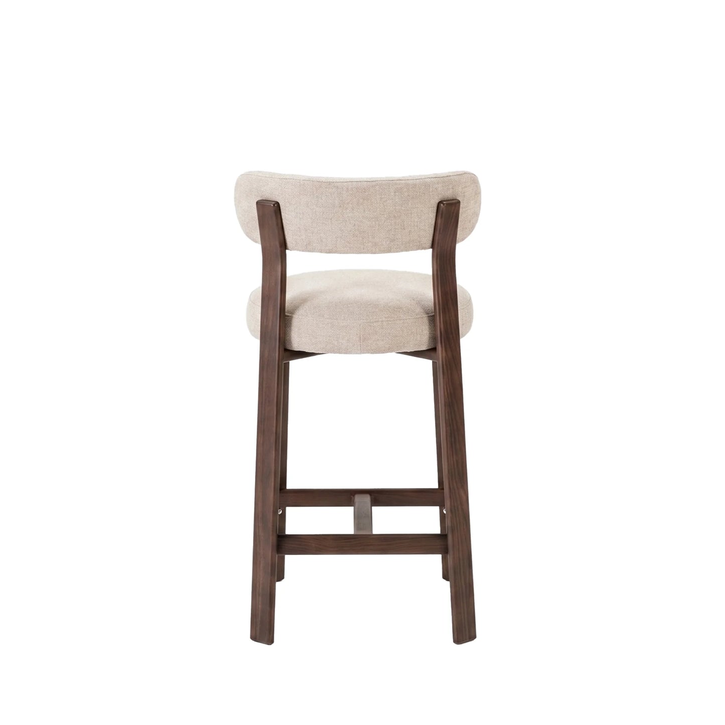 A modern bar stool with a curved backrest and seat cushion upholstered in a light beige textured fabric, supported by a dark brown wooden frame with a footrest, shown against a plain white background.