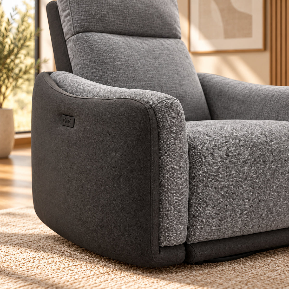 Momba Grey single seater electric recliner chair with two-tone fabric, curved arms and supportive high backrest, close up view