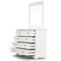 White dresser with multiple drawers and a mirror on a white background
