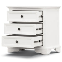 White dresser with three drawers on a white background