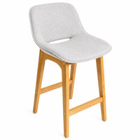 A modern bar stool with a light gray upholstered seat and a natural light wood frame, shown on a plain white background.