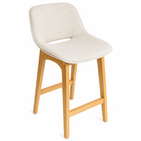 A modern bar stool with a light beige upholstered seat and a natural light wood frame with four legs and front support bars, shown on a white background.