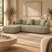 Alberta Pistachio 3 seater chaise lounge with rounded arms, tufted upholstery and three scatter cushions, left-hand chaise view