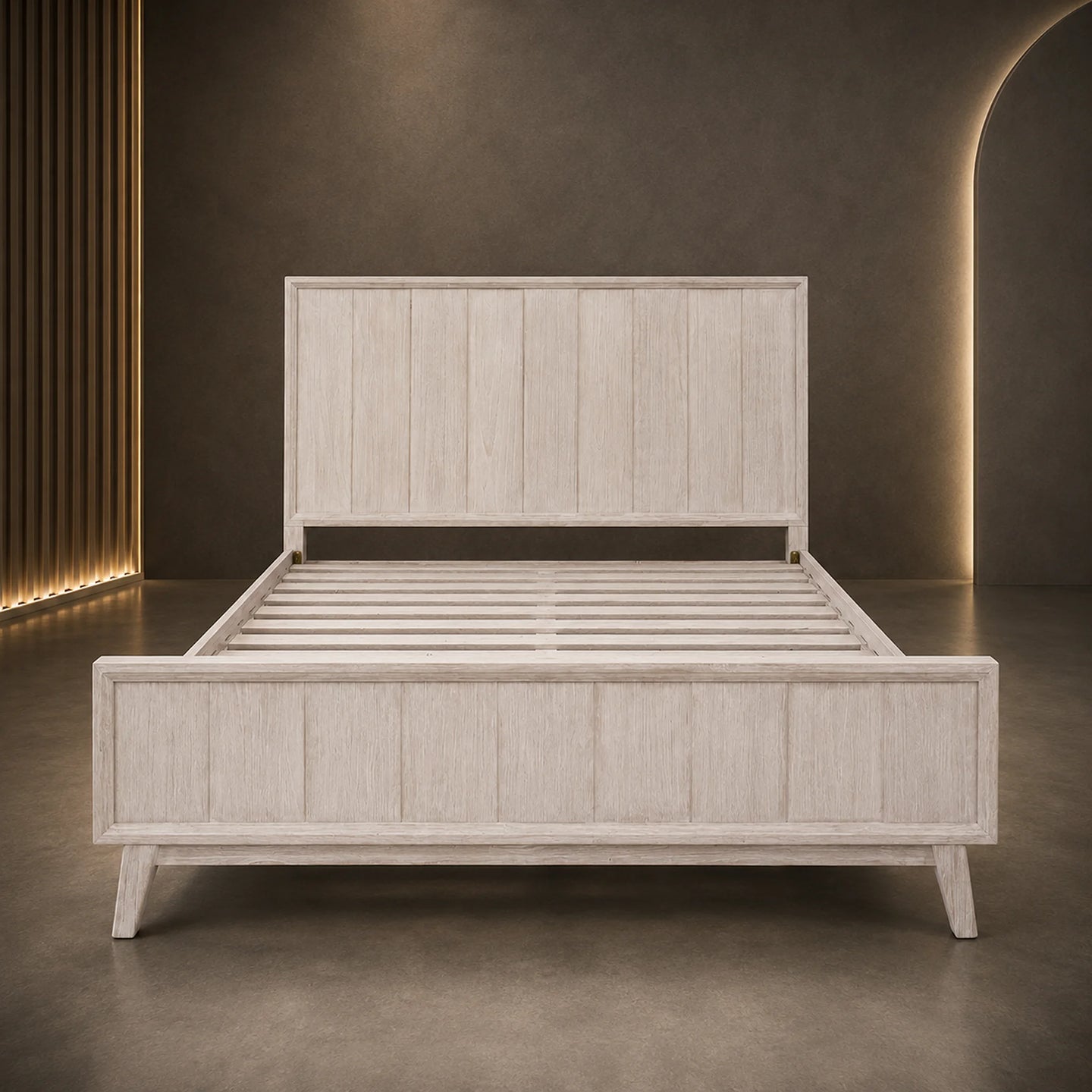 A light-colored wooden platform bed frame with a tall slatted headboard and matching footboard, shown in a modern studio setting with warm ambient lighting.