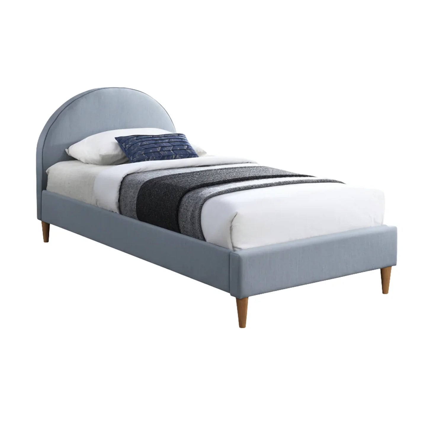 Gray upholstered bed with white bedding and blue pillows on a white background