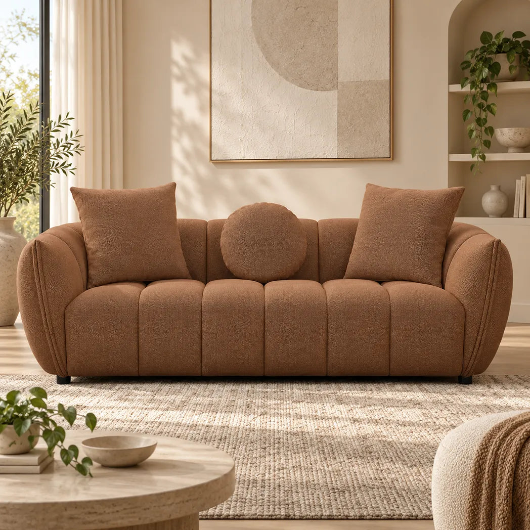 Aria 3 Seater Sofa in Cinnamon with rounded arms, channel detailing and coordinating scatter cushions – front view