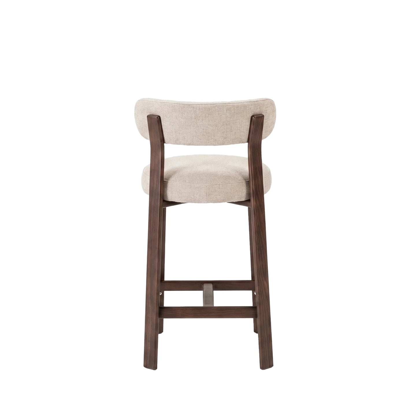 A modern bar stool with a curved backrest and seat cushion upholstered in a light beige textured fabric, supported by a dark brown wooden frame with a footrest, shown against a plain white background.