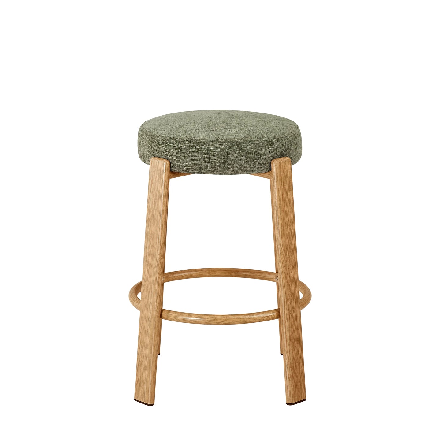 A modern bar stool with a round, textured sage green upholstered seat and four light natural wood legs, featuring a lower circular footrest ring.