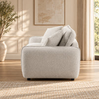 Bradman Snow 2 seater duck feather sofa with curved arms, plush cushions and textured Shay fabric upholstery, side view
