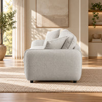 Bradman Snow 3 seater duck feather sofa with curved arms, plush cushions and textured Shay fabric upholstery, side view