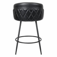 A modern bar stool with a black faux leather cushioned seat featuring a diamond-quilted pattern on the lower half, supported by slim black metal legs and a circular footrest, shown against a plain white background.