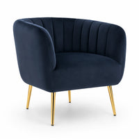 A modern barrel-style accent chair upholstered in dark navy blue velvet with vertical channel tufting on the backrest and tapered gold-finished metal legs, shown on a plain white background.