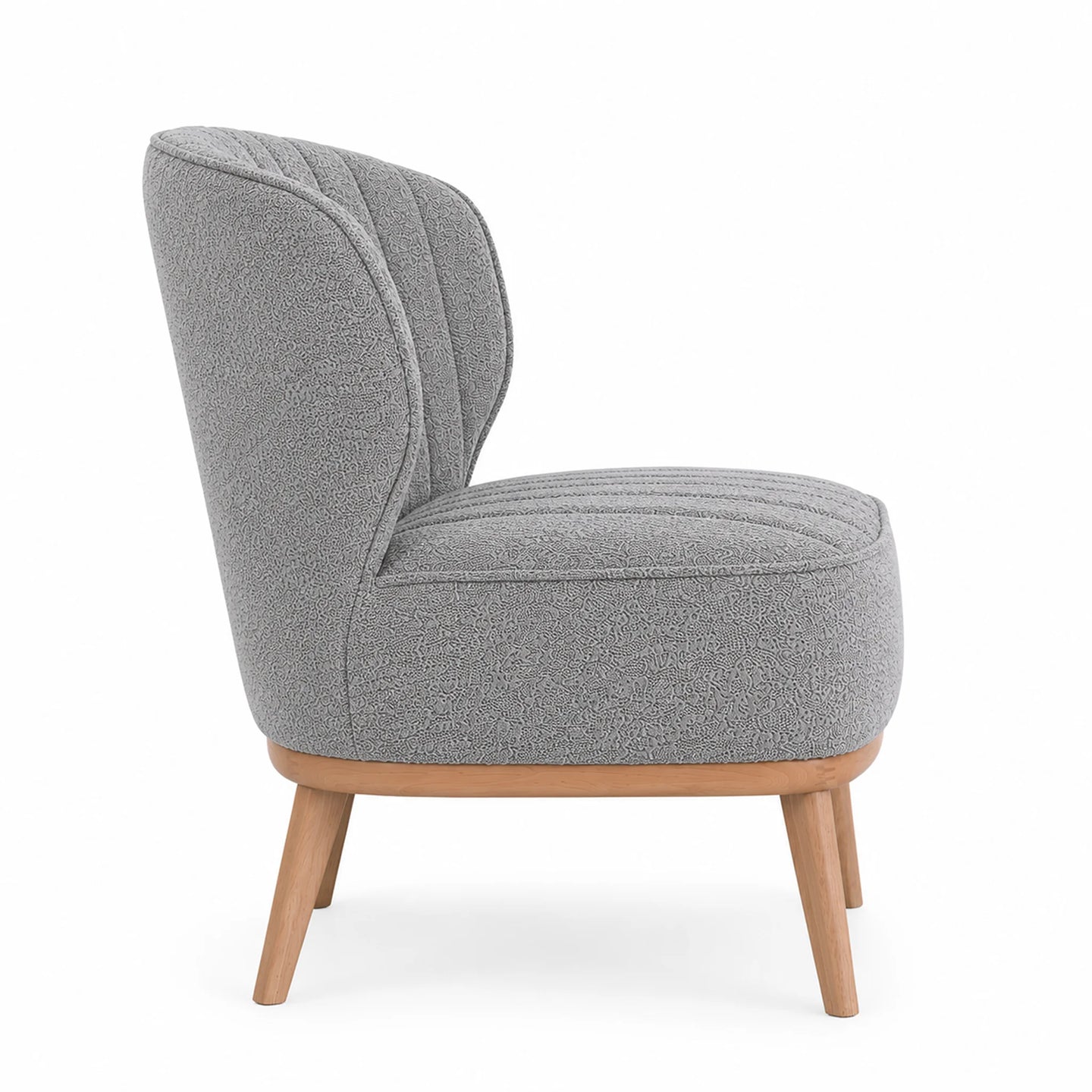 A modern accent chair with a textured gray bouclé fabric upholstery, a curved backrest, and light natural wood legs, shown from a three-quarter angle on a white background.