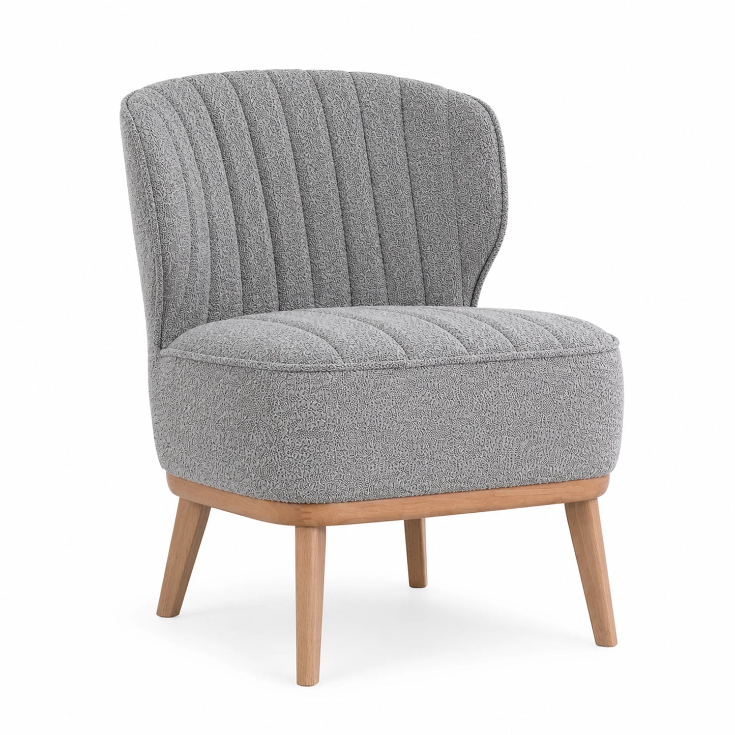A modern accent chair with a textured gray bouclé fabric, featuring a vertically channel-tufted backrest and a rounded seat cushion, supported by light natural wood legs on a white background.