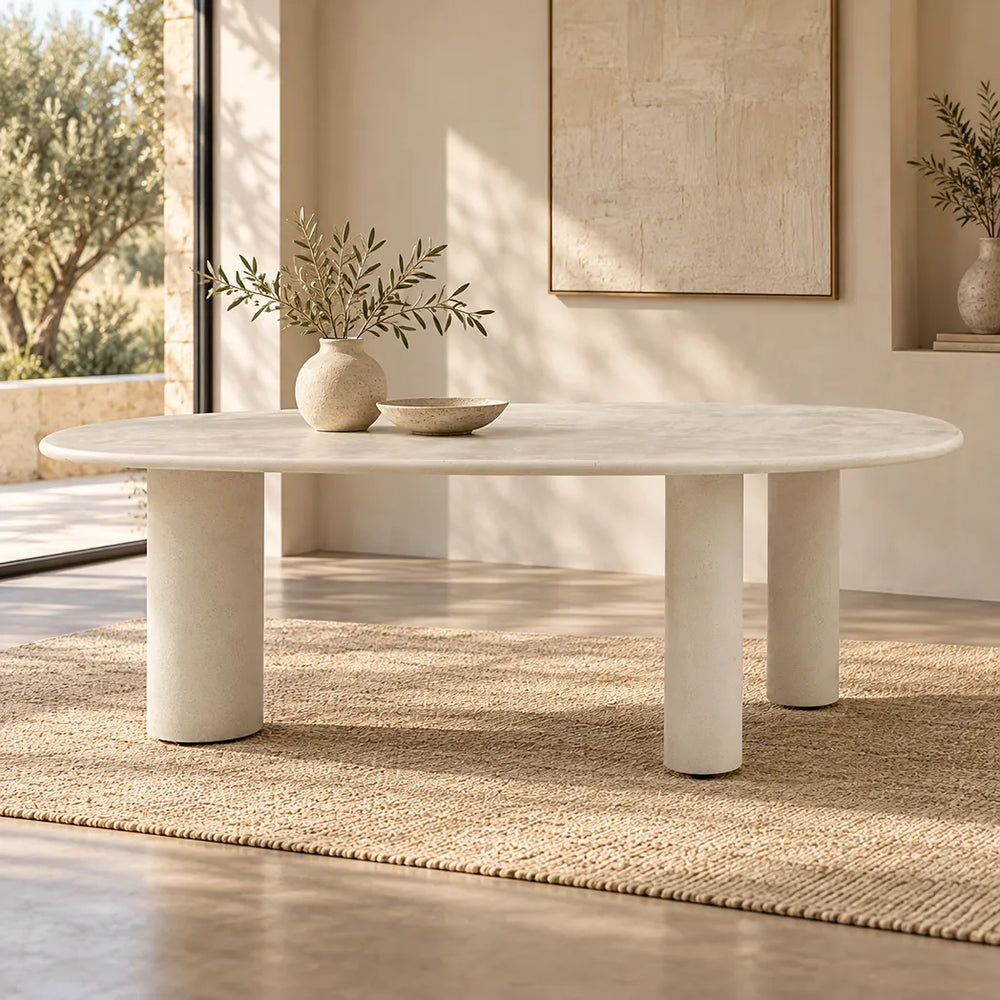 Coastal 2.3m Pebble dining table with matte micro-cement finish, organic asymmetrical tabletop and cylindrical legs
