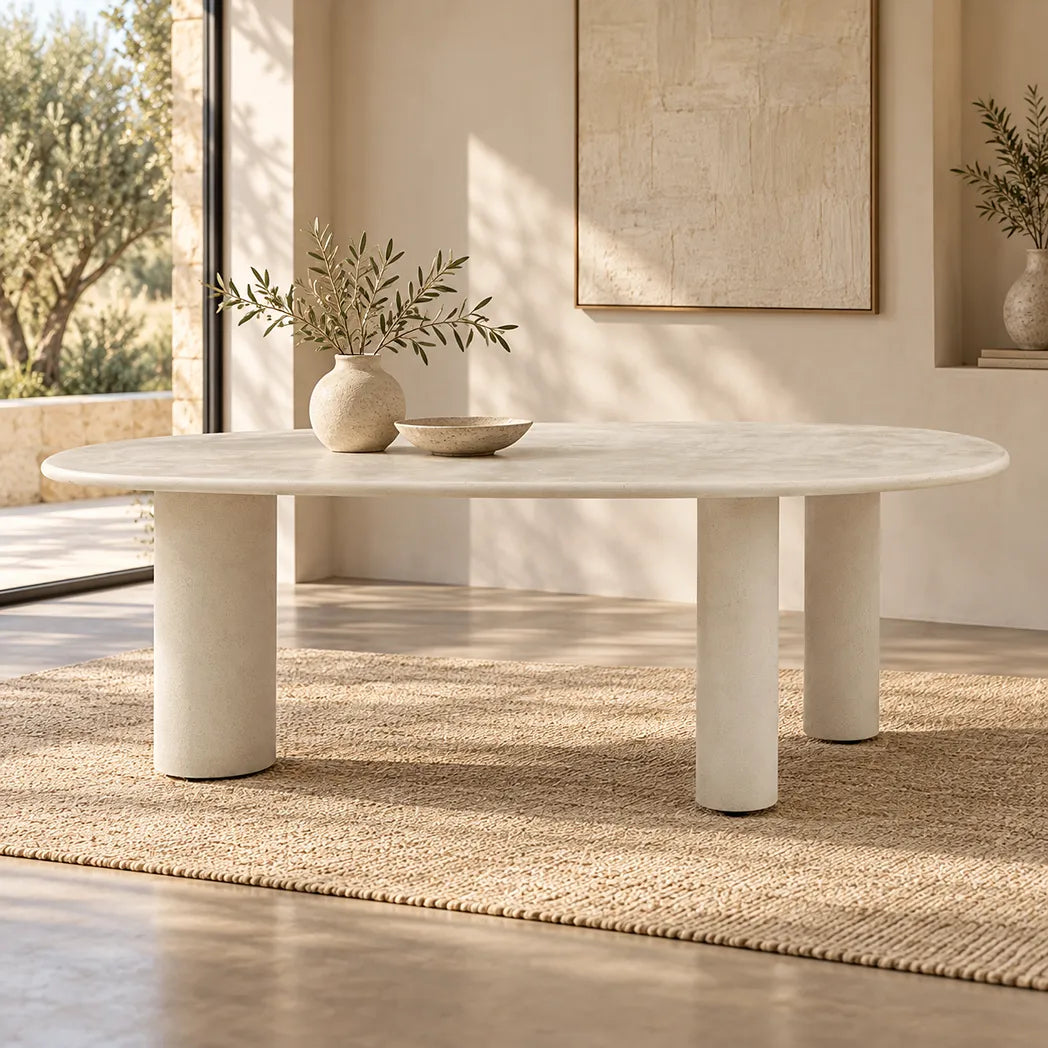 Coastal 2.3m Pebble dining table with matte micro-cement finish, organic asymmetrical tabletop and cylindrical legs
