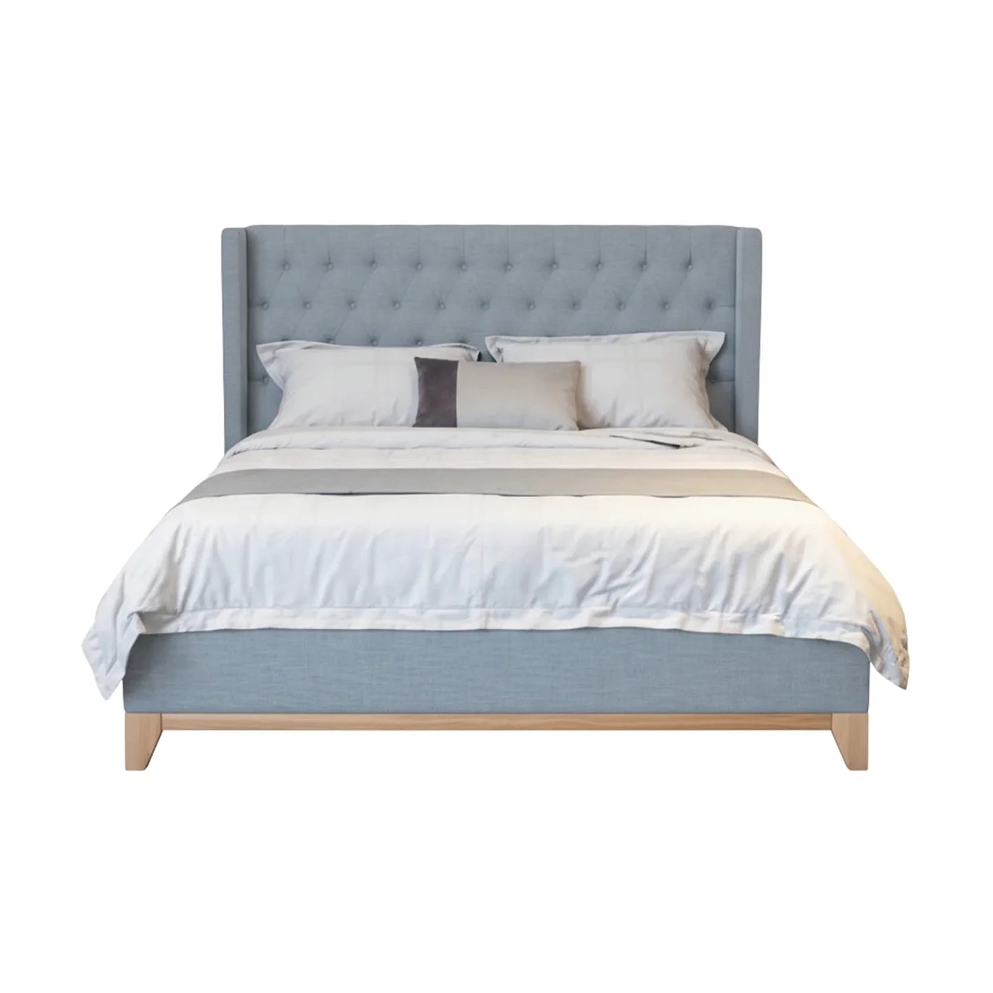 A light blue upholstered bed frame with a tufted headboard and wooden legs, shown with white bedding and pillows on a plain white background.