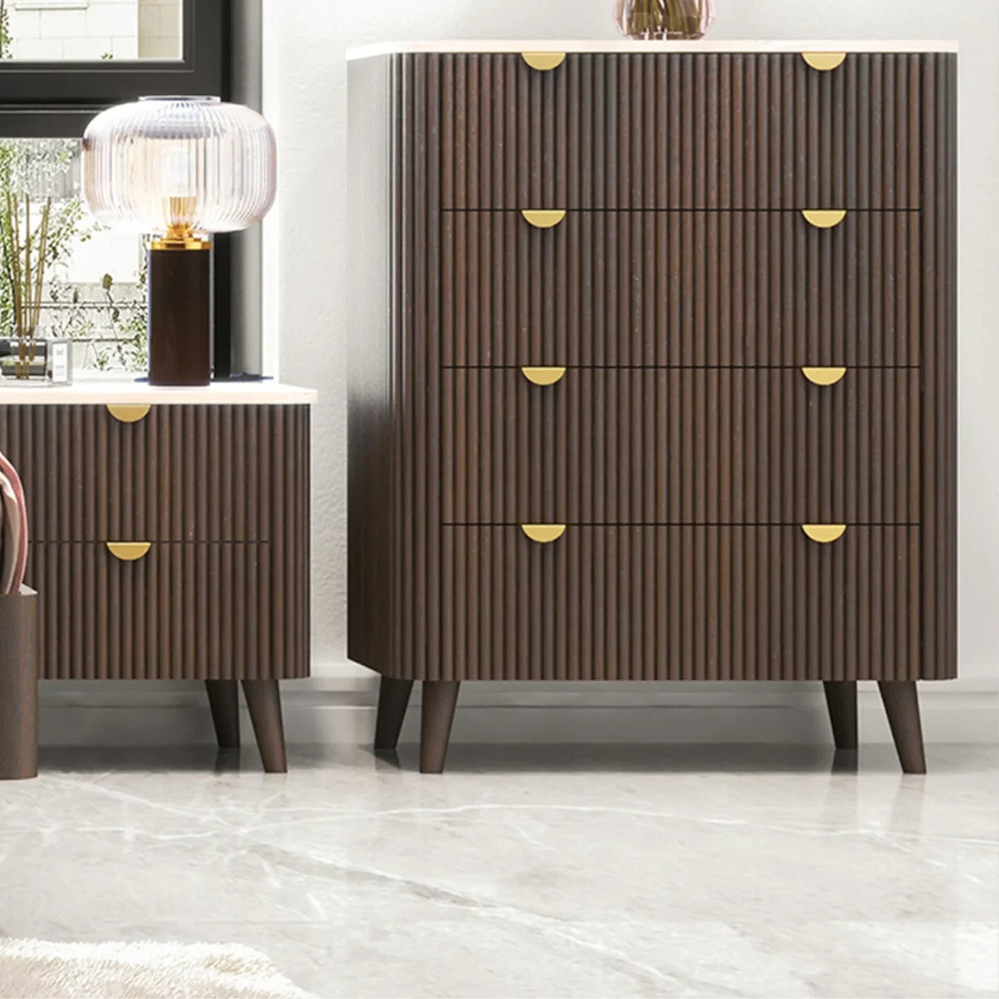 Wooden dresser with gold accents in a room setting