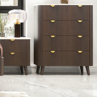 Wooden dresser with gold accents in a room setting