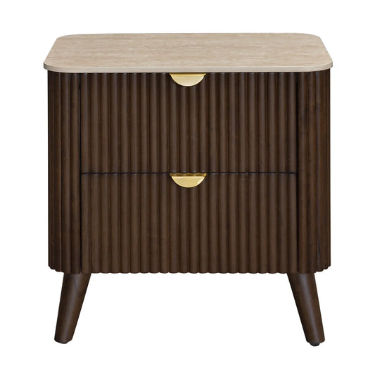 A mid-century modern two-drawer nightstand with a fluted dark brown wood cabinet, a light beige stone top, and gold-finished drawer pulls, shown on a plain white background.