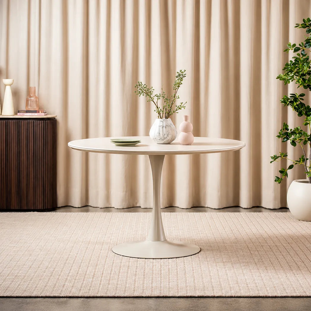 Elan 1.2m Matte Tofu round dining table with matte tempered glass top and powder-coated metal pedestal base, front view