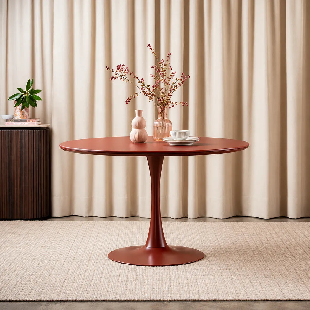 Elan 1.2m Matte Plum round dining table with matte tempered glass top and powder-coated metal pedestal base, front view