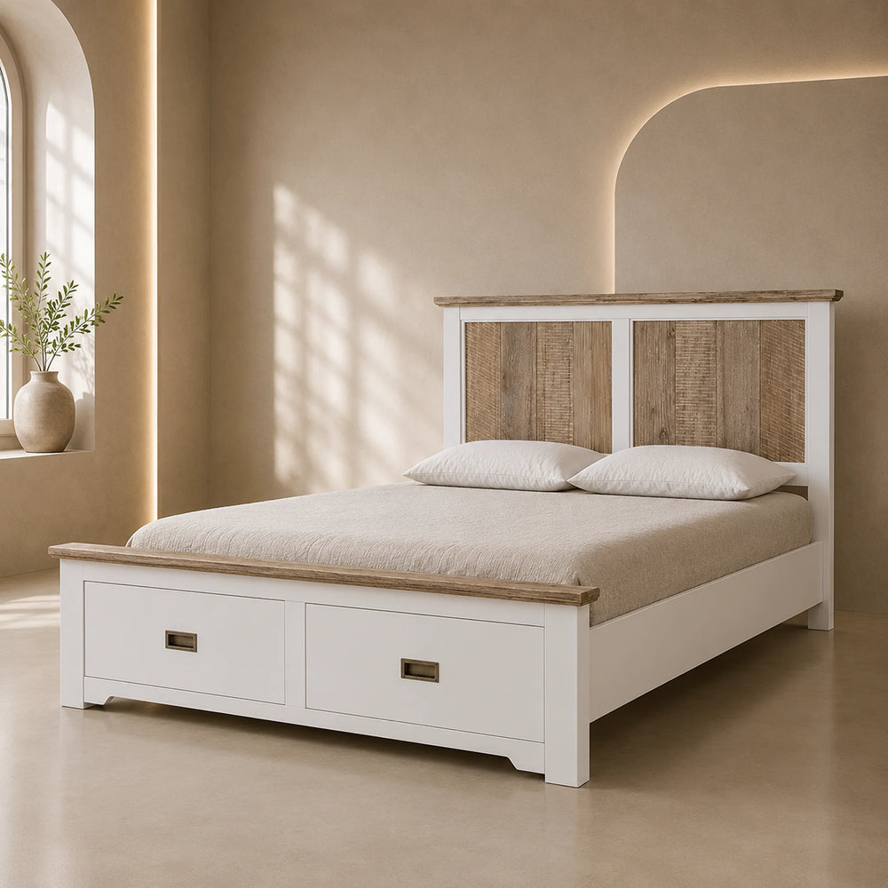 A white platform bed with a rustic wood headboard and footboard, styled with beige bedding and two pillows in a warm, minimalist bedroom setting.