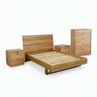 Wooden bedroom furniture set including a bed, dresser, and nightstands on a white background