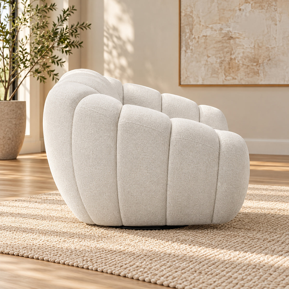 Kenya Beige swivel armchair with curved low-profile design, slanted arms and vertical panel detailing, side view