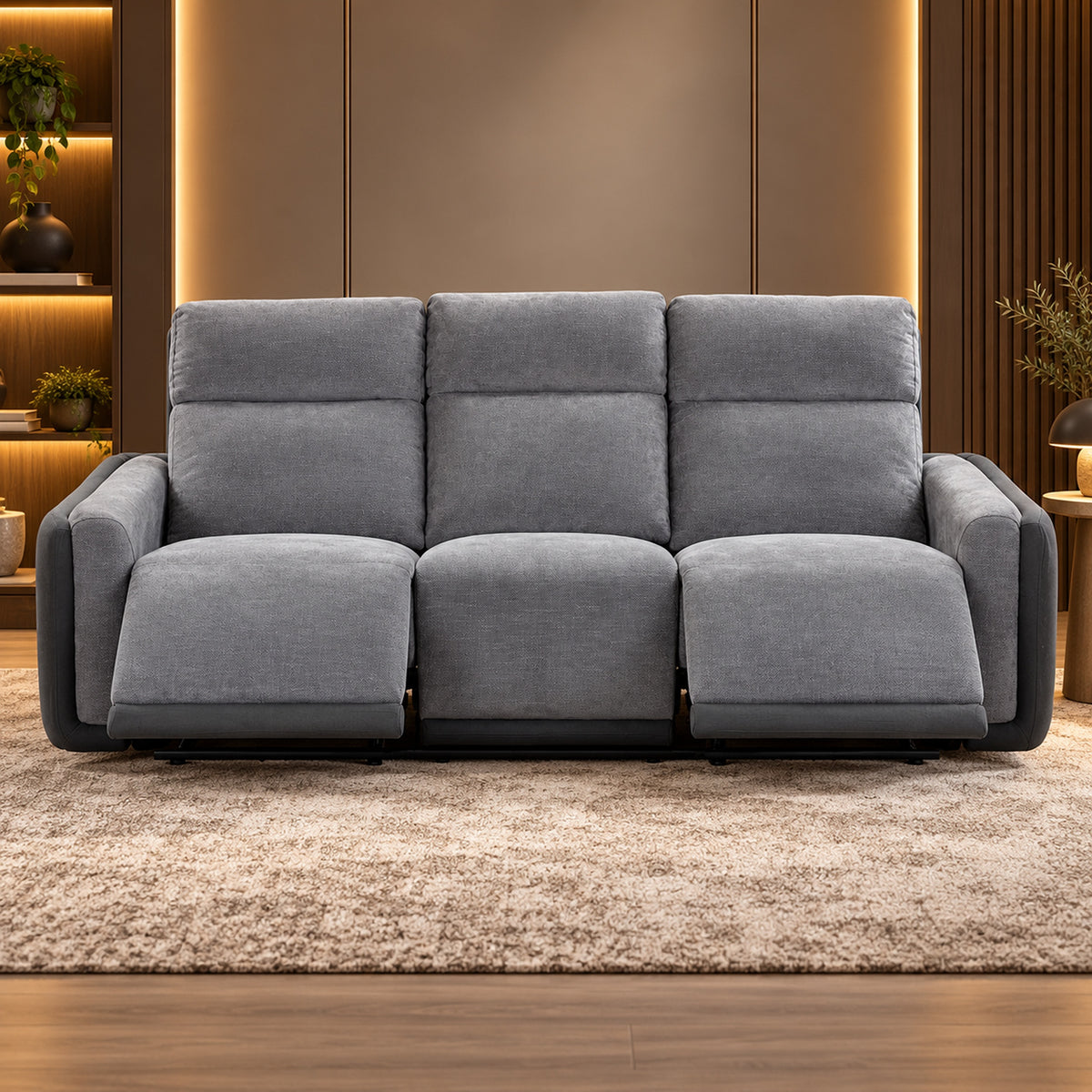 Momba Grey electric recliner lounge side view showing extended footrest, curved arm and electric recliner controls, front view