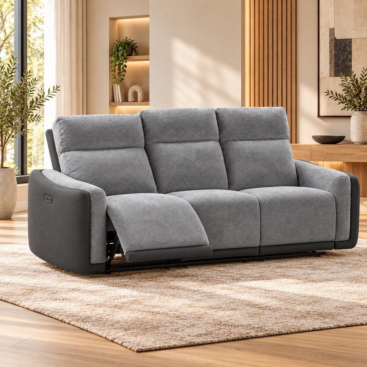 Momba Grey 3 seater electric recliner lounge with footrest extended, two-tone fabric and high backrests, angled view