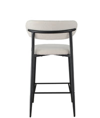 A modern barstool with a black metal frame and a textured cream bouclé upholstered seat and curved backrest, shown from the front on a white background.