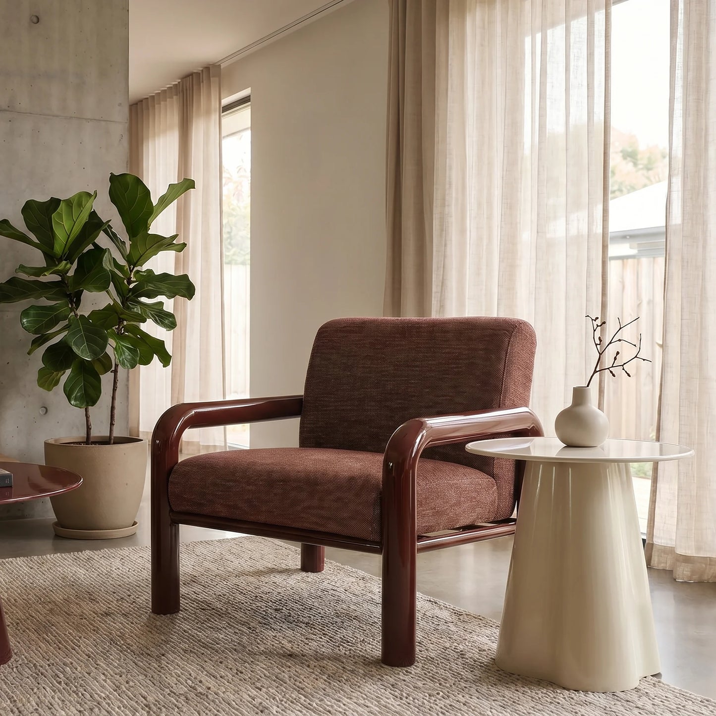 A mid-century modern armchair with a textured brown fabric seat and backrest, supported by dark wood arms and legs