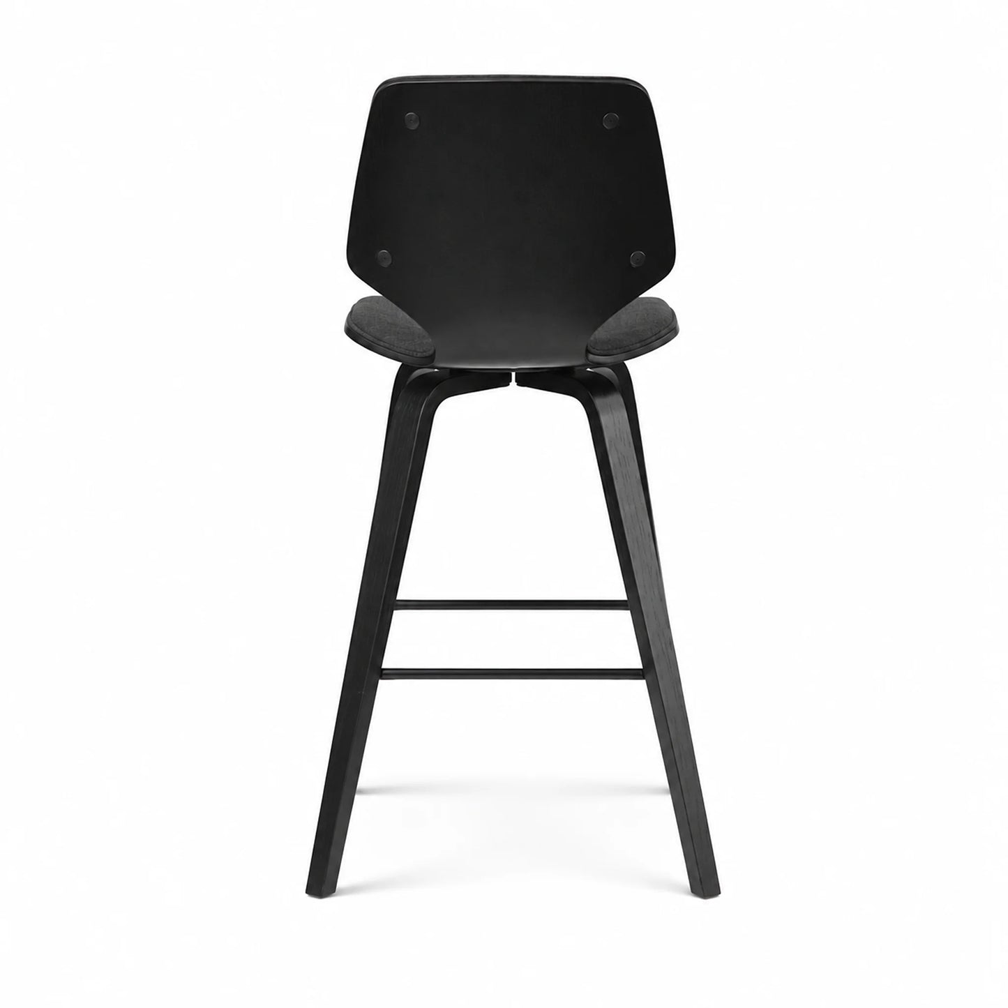 A modern black bar stool with a molded seat and backrest, supported by four tapered legs with a central footrest, shown from the front on a white background.