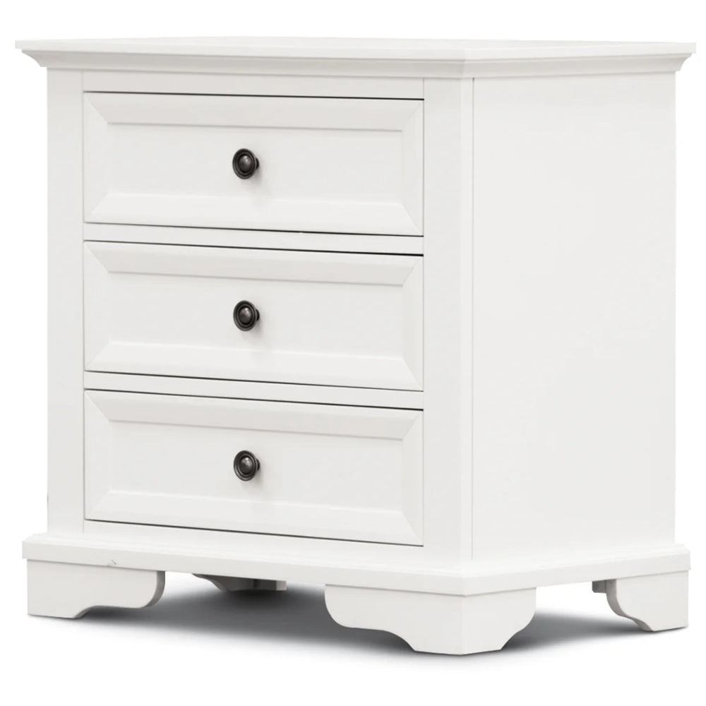 A white three-drawer nightstand with dark round knobs and a classic shaker-style design, shown on a clean white background.