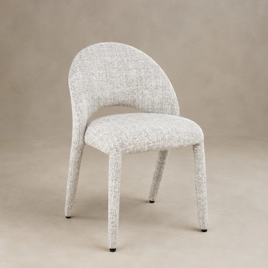 Siri stone fabric dining chair with curved open backrest