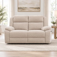 Stella beige 2 seater electric recliner lounge with padded armrests and high backrests, three-quarter view
