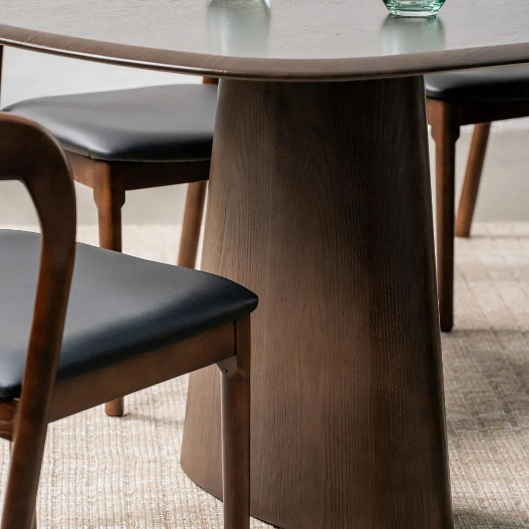 Tierra 2.2m Walnut dining table with sculptural asymmetrical ash veneer tabletop, softly rounded edges and curved pedestal legs