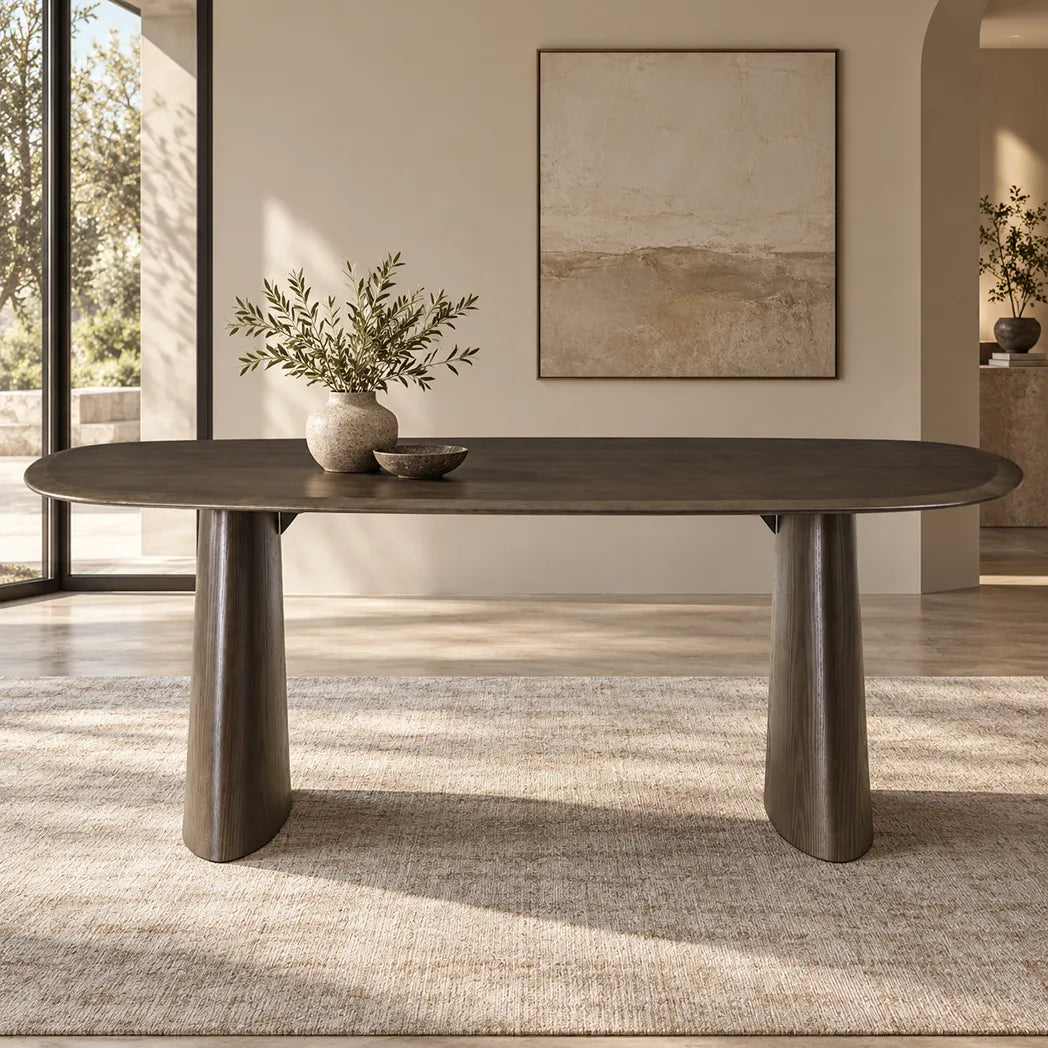 Tierra 2.2m Walnut dining table with sculptural asymmetrical ash veneer tabletop, softly rounded edges and curved pedestal legs, side view