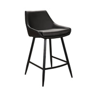 A modern counter height bar stool with a black upholstered seat and curved backrest, supported by four tapered black metal legs with a central footrest, shown on a plain white background.