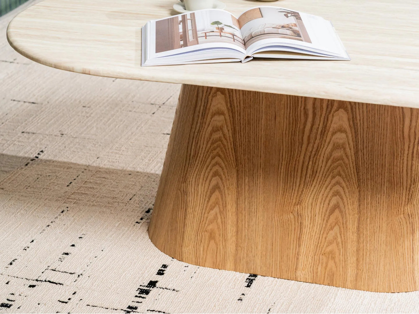 Waverley 130cm oval White Travertine marble coffee table with ash veneer pedestal-leg detail