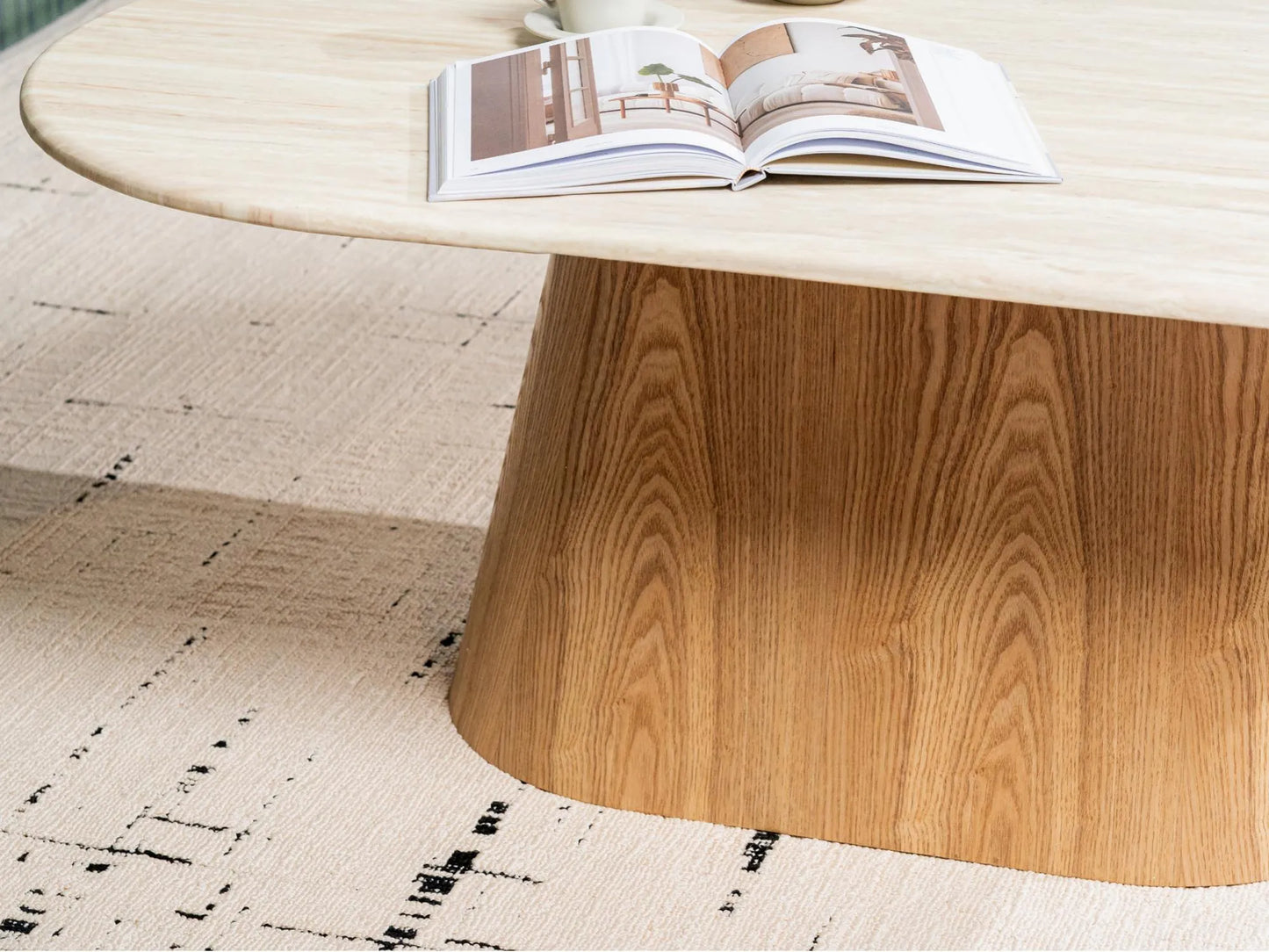 Waverley 130cm oval White Travertine marble coffee table with ash veneer pedestal-leg detail
