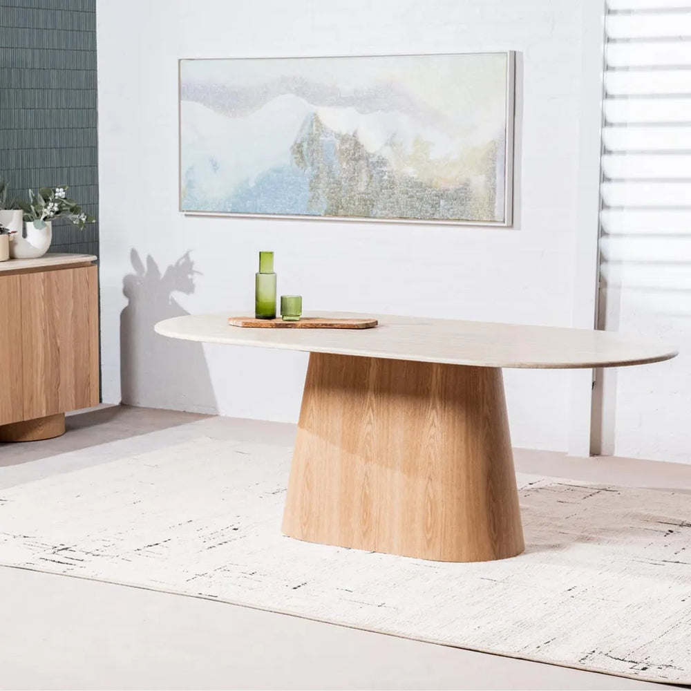 Waverley oval dining table with matte White Travertine-look top and ash veneer MDF pedestal – front view