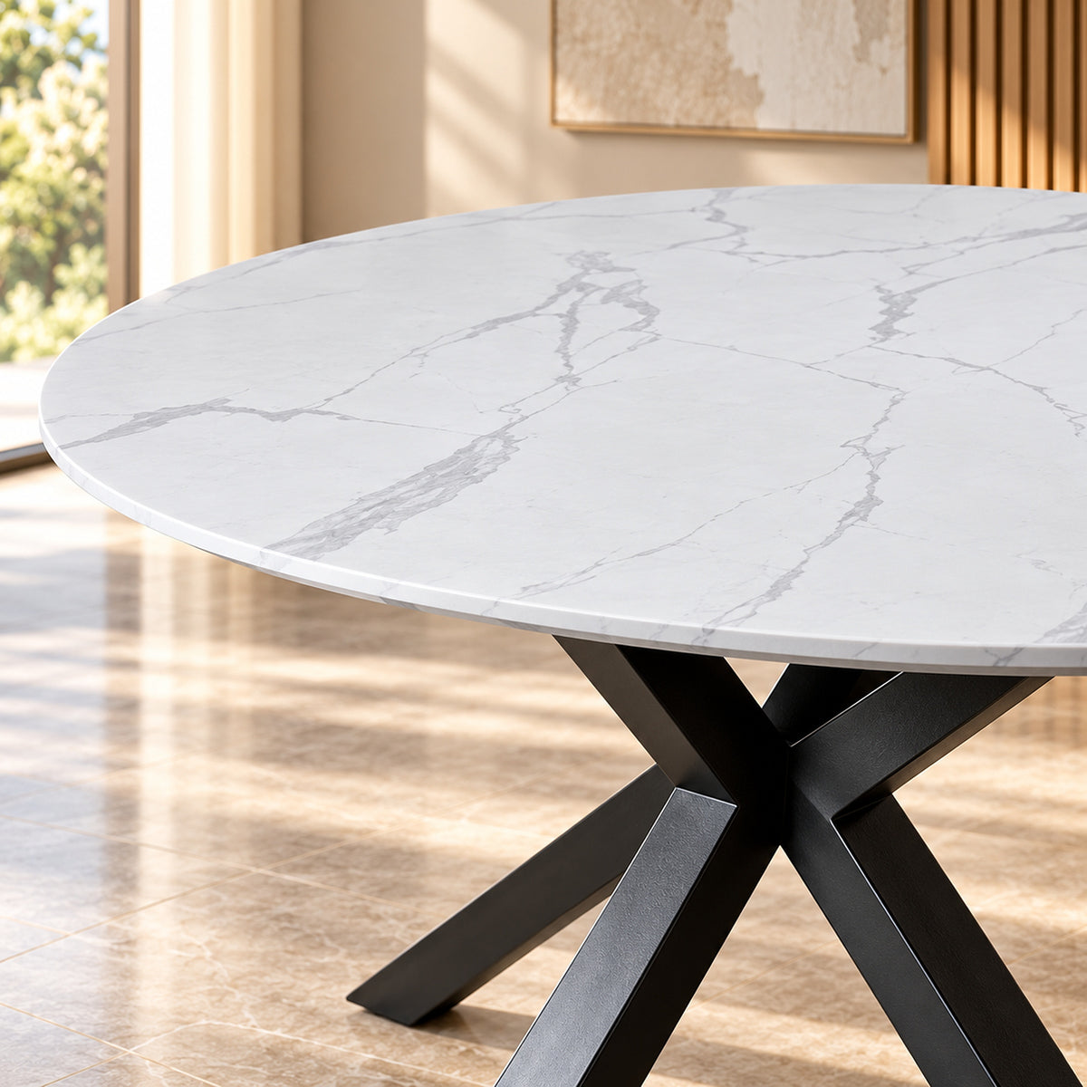 Zorian 1.2m White round dining table with marble-look top and sculptural black powder-coated metal legs, close up view